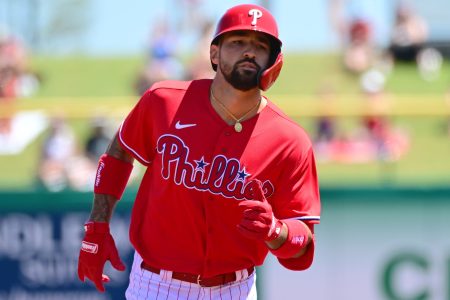 Nick Castellanos #8 of the Philadelphia Phillies runs the bases after hitting a two-run home run in the first inning against the Baltimore Orioles during the spring training game at BayCare Ballpark on March 28, 2022 in Clearwater, Florida.