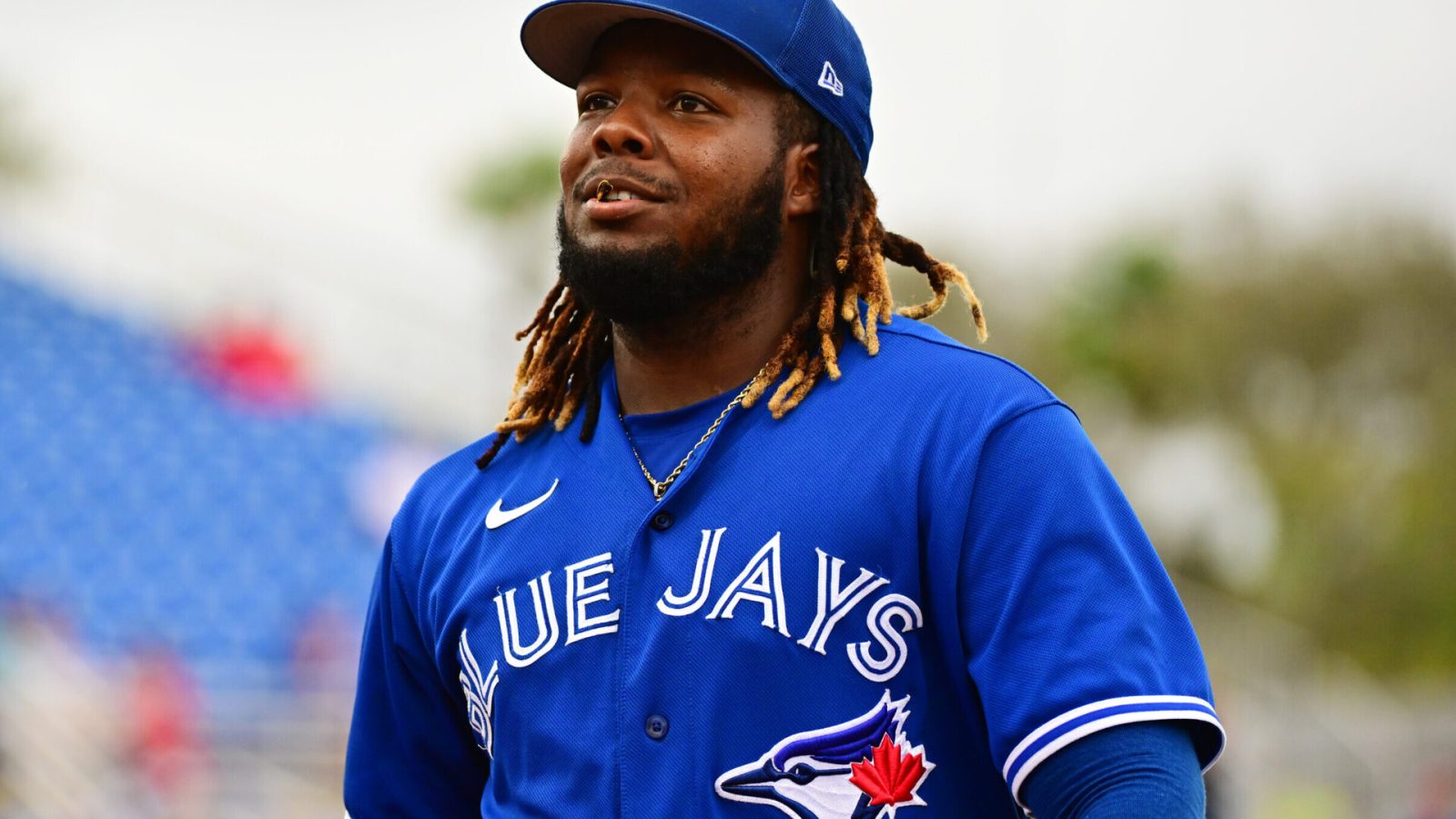 Vladimir Guerrero Jr. #27 of the Toronto Blue Jays returns to the dugout in the middle of the fourth inning against the Philadelphia Phillies during a Grapefruit League