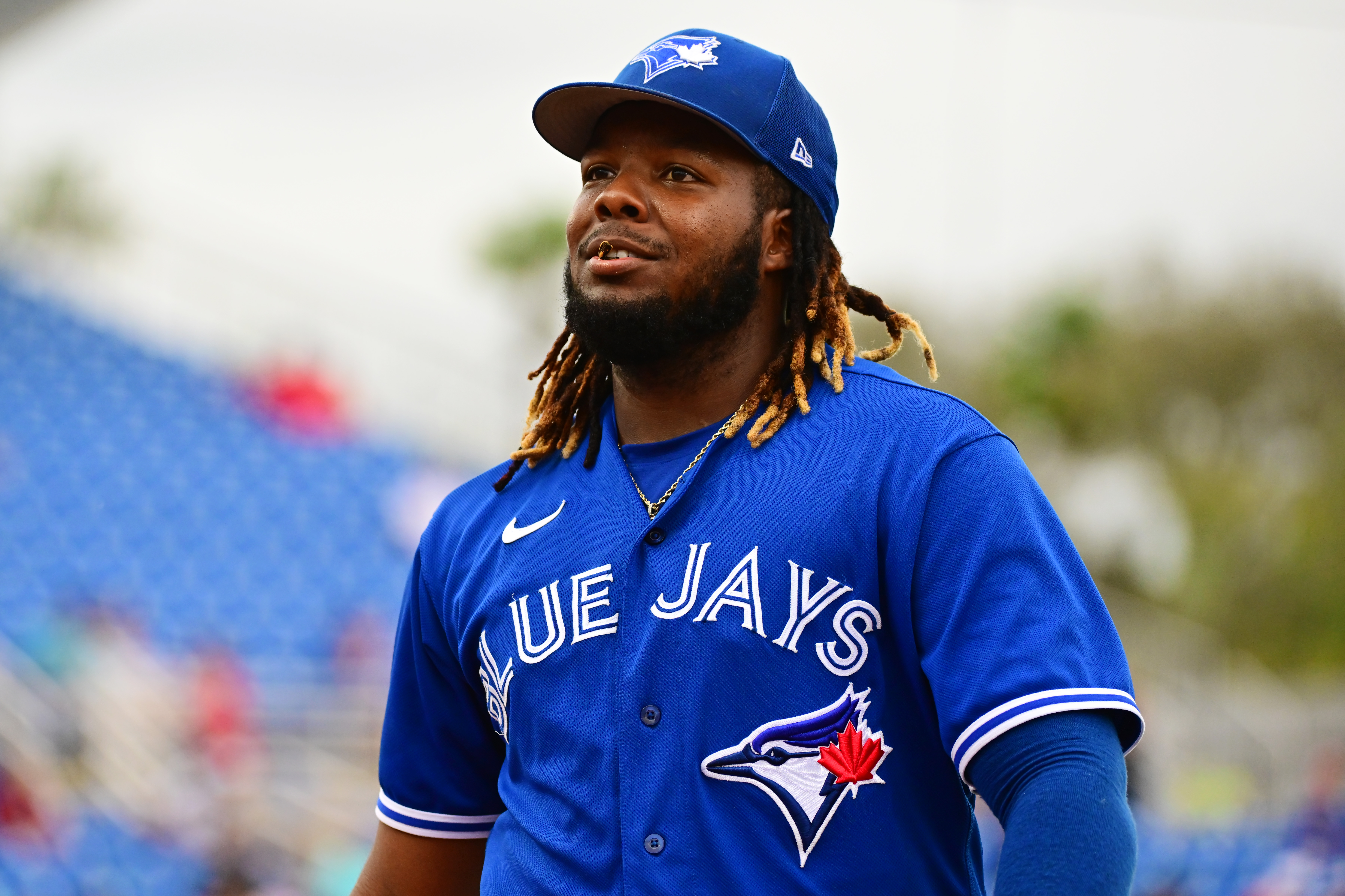 Vladimir Guerrero Jr. #27 of the Toronto Blue Jays returns to the dugout in the middle of the fourth inning against the Philadelphia Phillies during a Grapefruit League