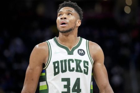 Giannis Antetokounmpo #34 of the Milwaukee Bucks looks on against the Detroit Pistons at Little Caesars Arena on April 08, 2022 in Detroit, Michigan.