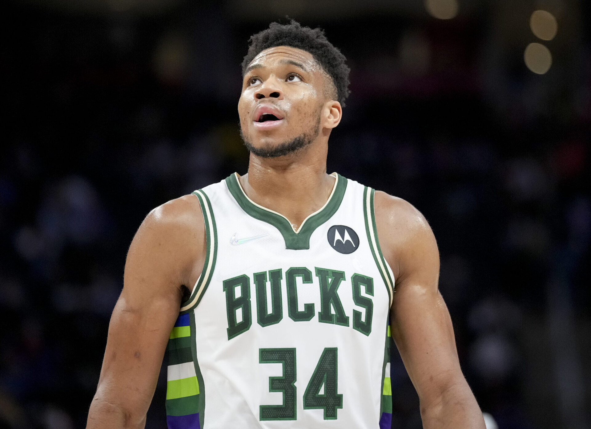 Giannis Antetokounmpo #34 of the Milwaukee Bucks looks on against the Detroit Pistons at Little Caesars Arena on April 08, 2022 in Detroit, Michigan.