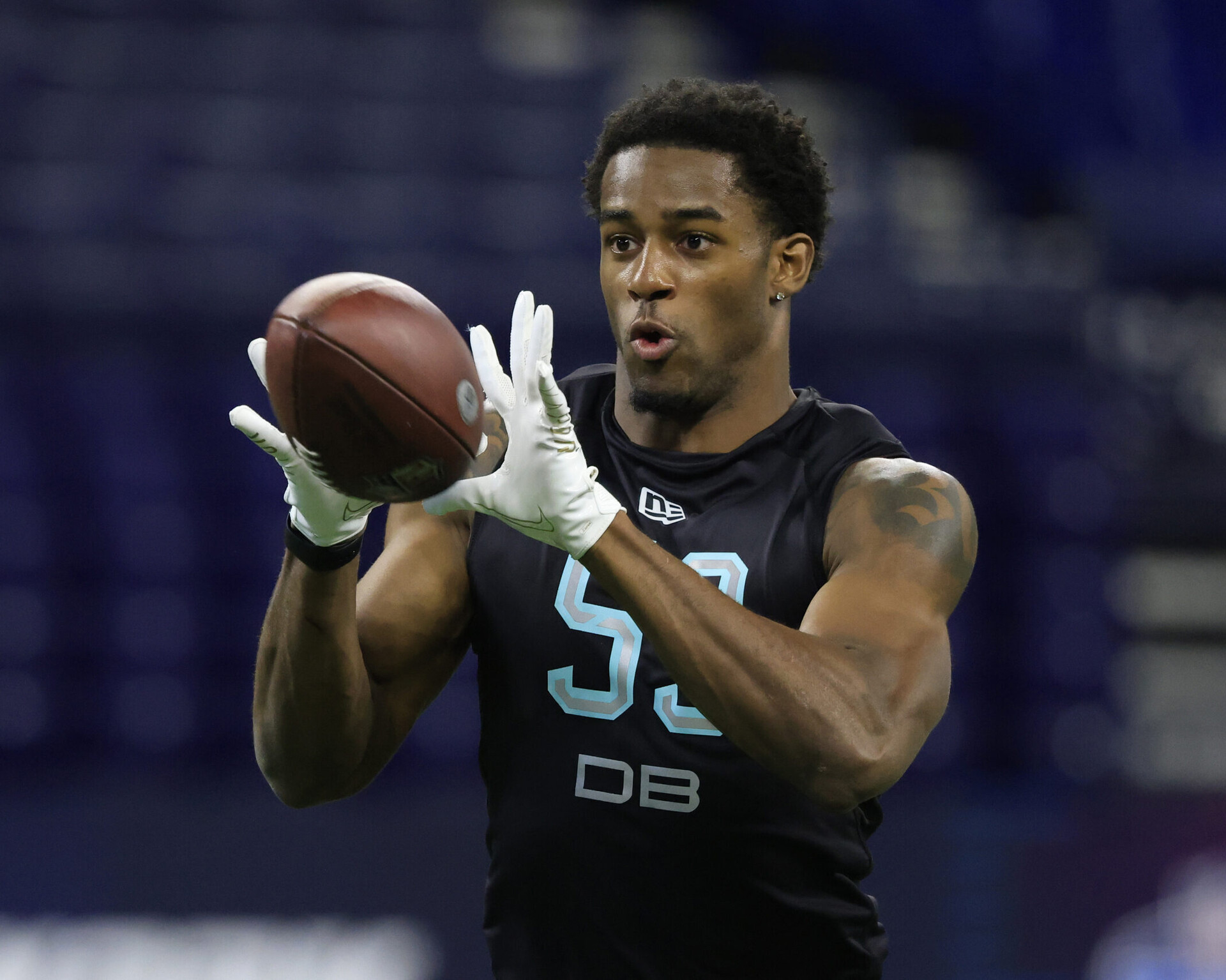 Dax Hill #DB53 of the Michigan Wolverines