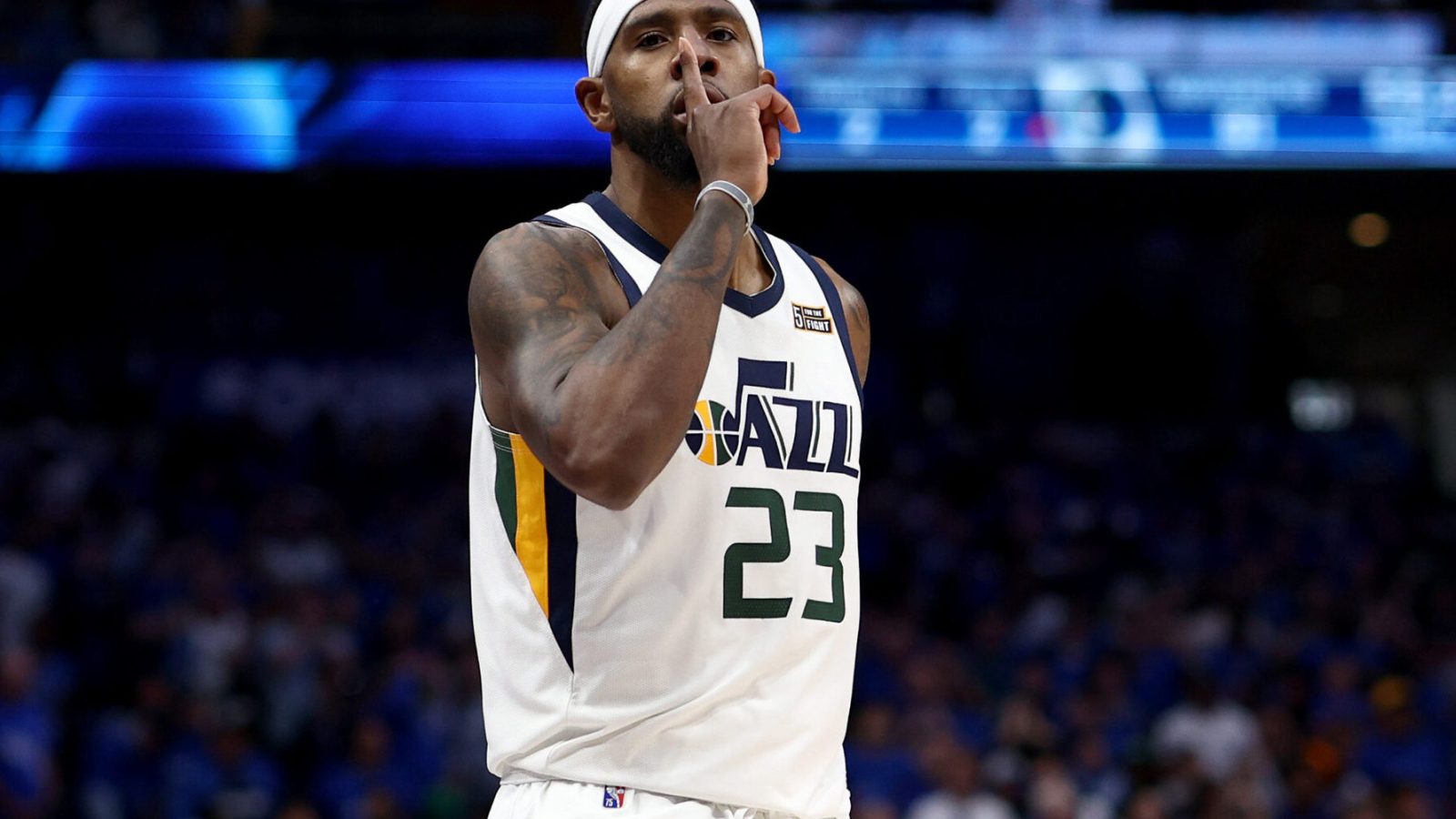 Royce O'Neale #23 of the Utah Jazz reacts after scoring against the Dallas Mavericks in the fourth quarter of Game One of the Western Conference First Round NBA Playoffs at American Airlines Center on April 16, 2022 in Dallas, Texas.