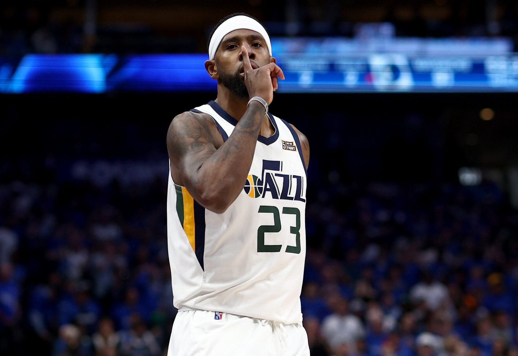 Royce O'Neale #23 of the Utah Jazz reacts after scoring against the Dallas Mavericks in the fourth quarter of Game One of the Western Conference First Round NBA Playoffs at American Airlines Center on April 16, 2022 in Dallas, Texas.