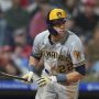 Christian Yelich #22 of the Milwaukee Brewers bats against the Philadelphia Phillies at Citizens Bank Park on April 22, 2022 in Philadelphia, Pennsylvania. The Philadelphia Phillies defeated the Milwaukee Brewers 4-2.