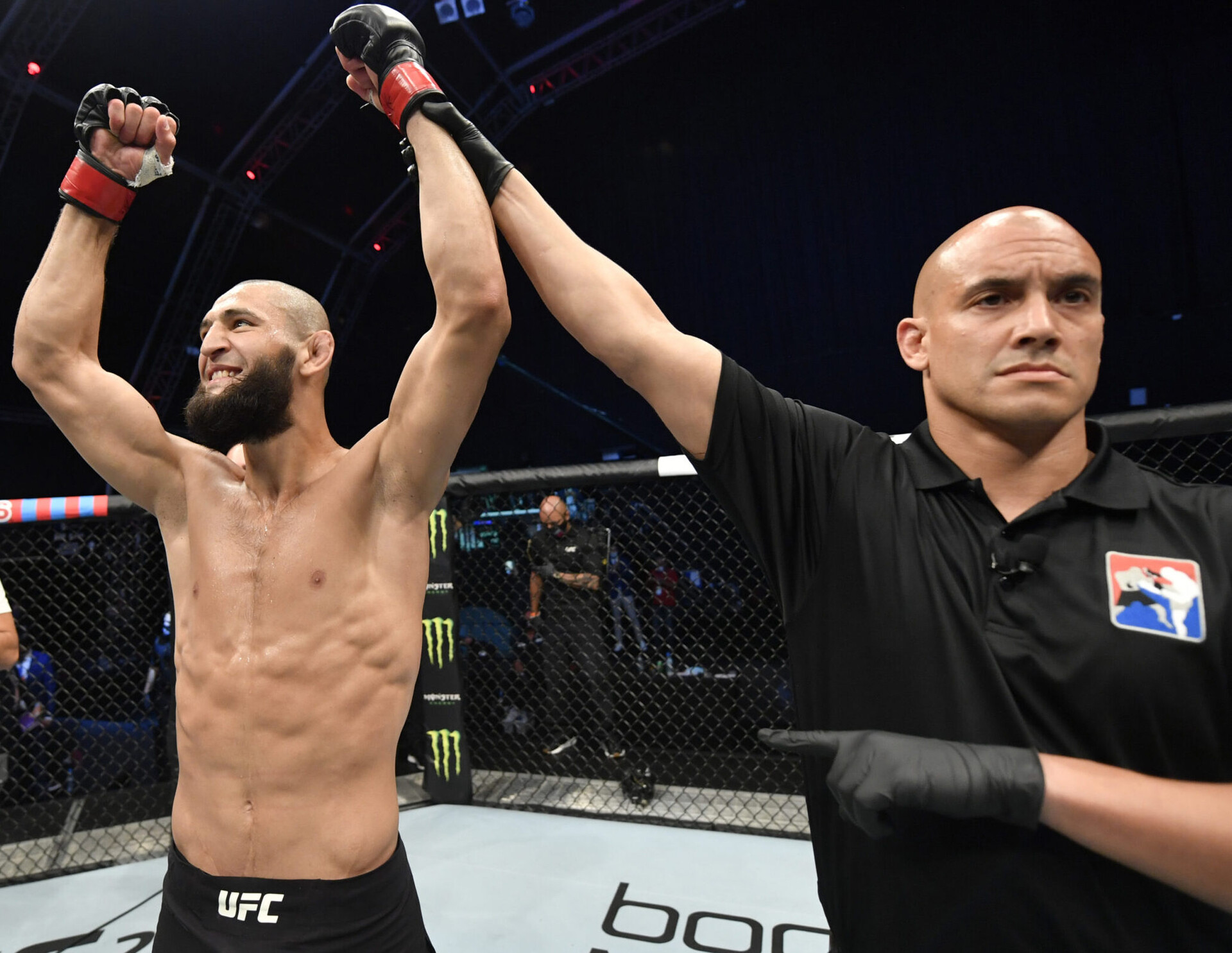 UFC fighter Khamzat Chimaev raises both arms in celebration after his TKO victory over Rhys McKee (not pictured) in their welterweight UFC Fight Night bout