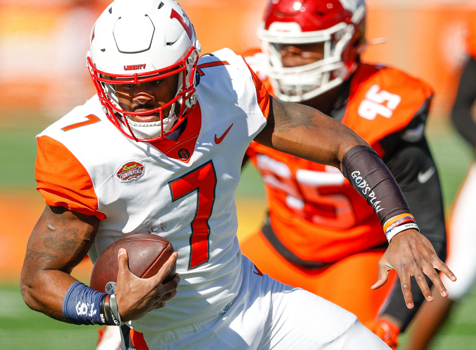 American squad quarterback Malik Willis of Liberty (7) in the first half against the National squad during the Senior bowl at Hancock Whitney Stadium in Mobile, Ala.