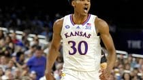 Kansas Jayhawks guard Ochai Agbaji shoults after a play against the Villanova Wildcats in the 2022 NCAA men's basketball tournament Final Four semifinals