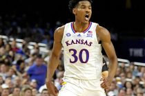 Kansas Jayhawks guard Ochai Agbaji shoults after a play against the Villanova Wildcats in the 2022 NCAA men's basketball tournament Final Four semifinals