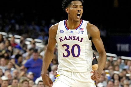 Kansas Jayhawks guard Ochai Agbaji shoults after a play against the Villanova Wildcats in the 2022 NCAA men's basketball tournament Final Four semifinals