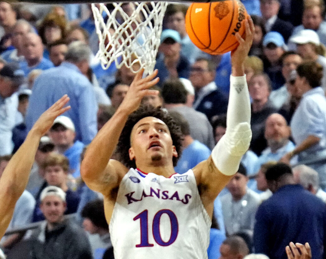 Kansas Jayhawks forward Jalen Wilson (10) shoots the ball against Villanova Wildcats guard Caleb Daniels (14) during the second half in the 2022 NCAA men's basketball tournament Final Four semifinals at Caesars Superdome in New Orleans on Saturday, April 2, 2022.