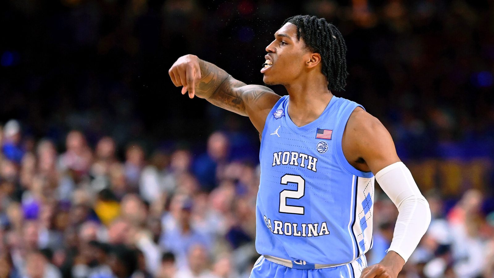 North Carolina Tar Heels guard Caleb Love (2) reacts after a play against the Duke Blue Devils during the second half during the 2022 NCAA men's basketball tournament Final Four semifinals at Caesars Superdome.