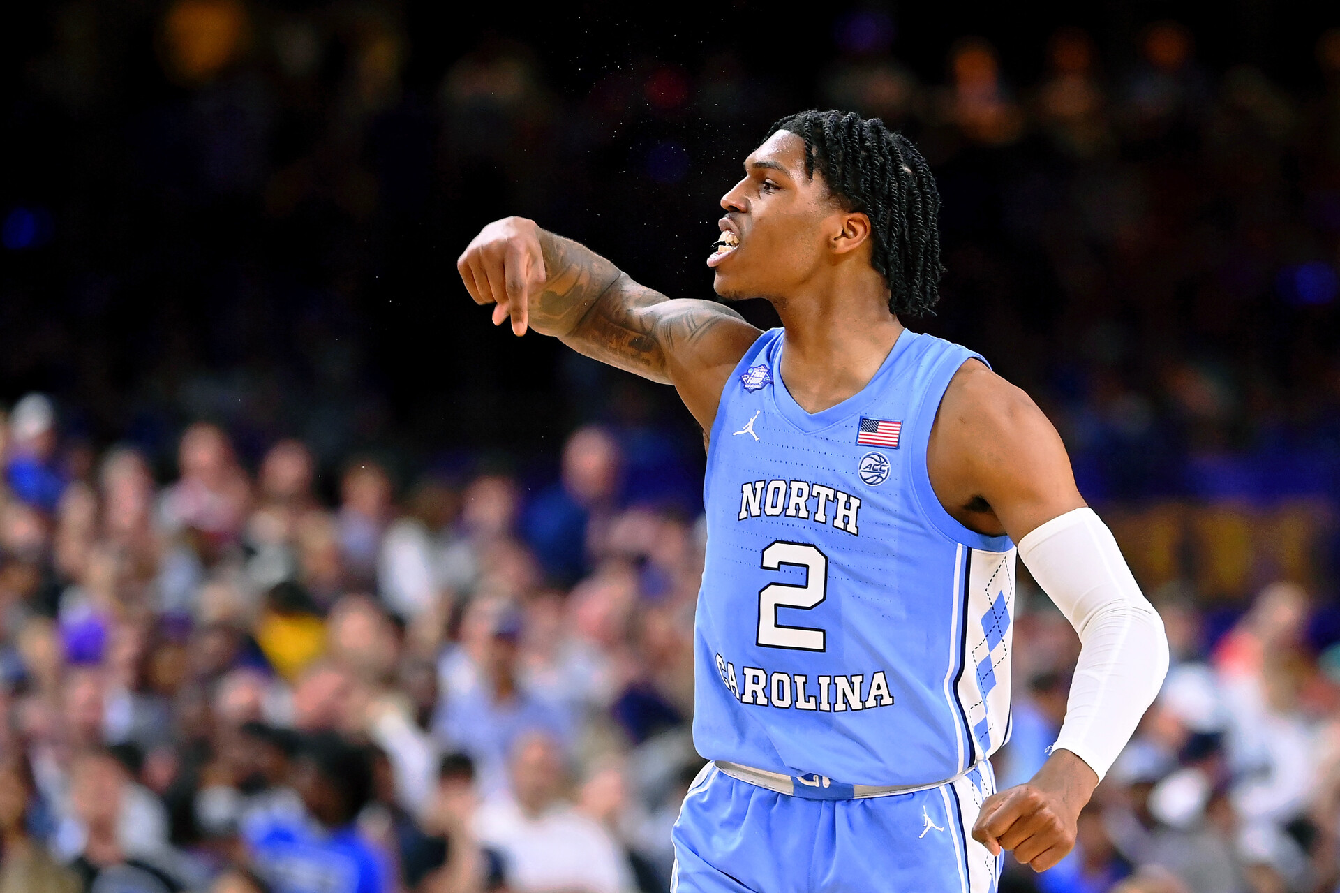 North Carolina Tar Heels guard Caleb Love (2) reacts after a play against the Duke Blue Devils during the second half during the 2022 NCAA men's basketball tournament Final Four semifinals at Caesars Superdome.