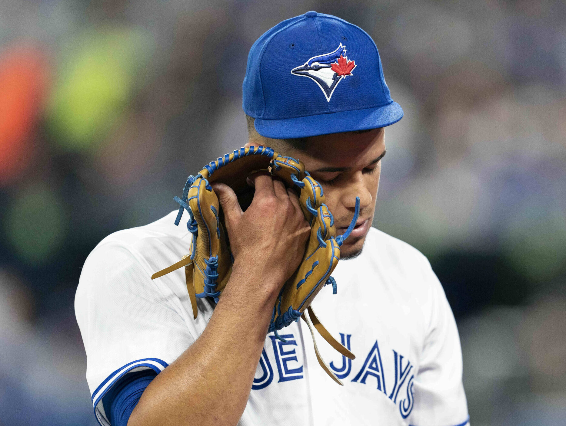 Toronto Blue Jays starting pitcher Jose Berrios (17) walks towards the dugout after being relieved during the first inning against the Texas Rangers at Rogers Centre on April 8, 2022.