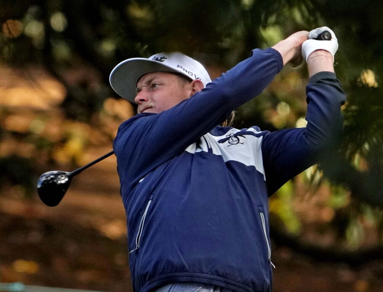Cameron Smith plays from the fairway on the 18th hole during the third round of The Masters golf tournament on Saturday, April 9, 2022.