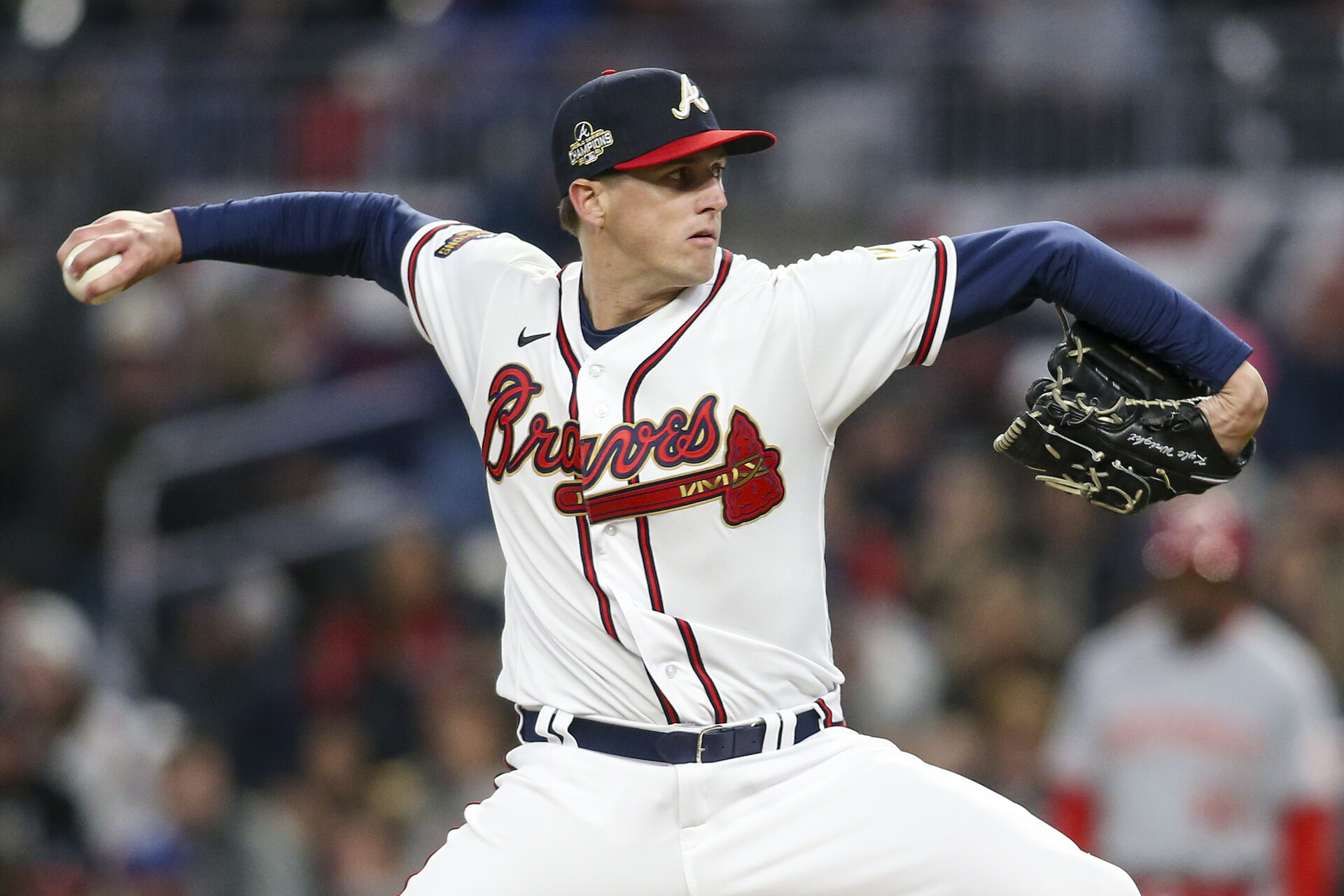 Atlanta Braves right-handed starting pitcher Kyle Wright reaches back and prepares to throw a pitch against the Cincinnati Reds