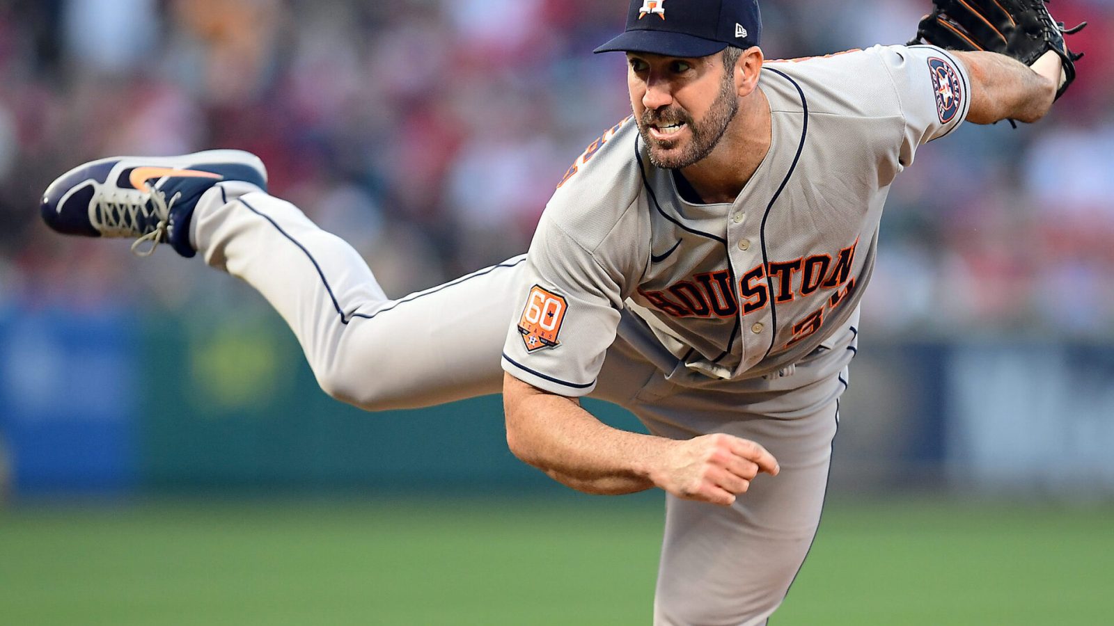Houston Astros starting pitcher Justin Verlander grimaces as he follows through on a pitch against the Los Angeles Angels
