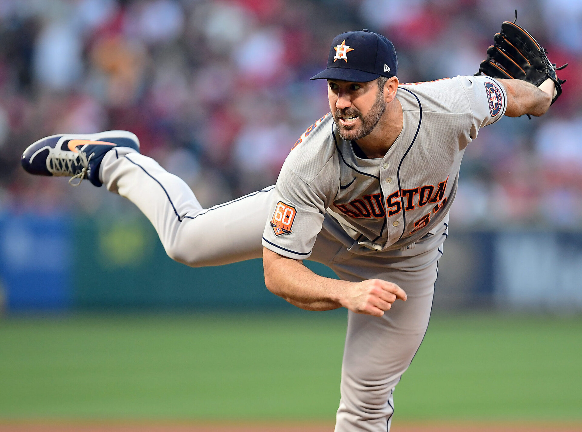 Houston Astros starting pitcher Justin Verlander grimaces as he follows through on a pitch against the Los Angeles Angels