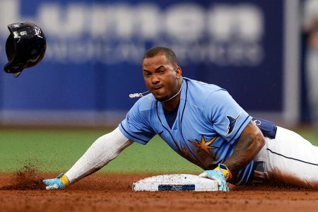 Tampa Bay Rays shortstop Wander Franco slides head first into second base and his helmet flies off after a successful steal attempt against the Baltimore Orioles