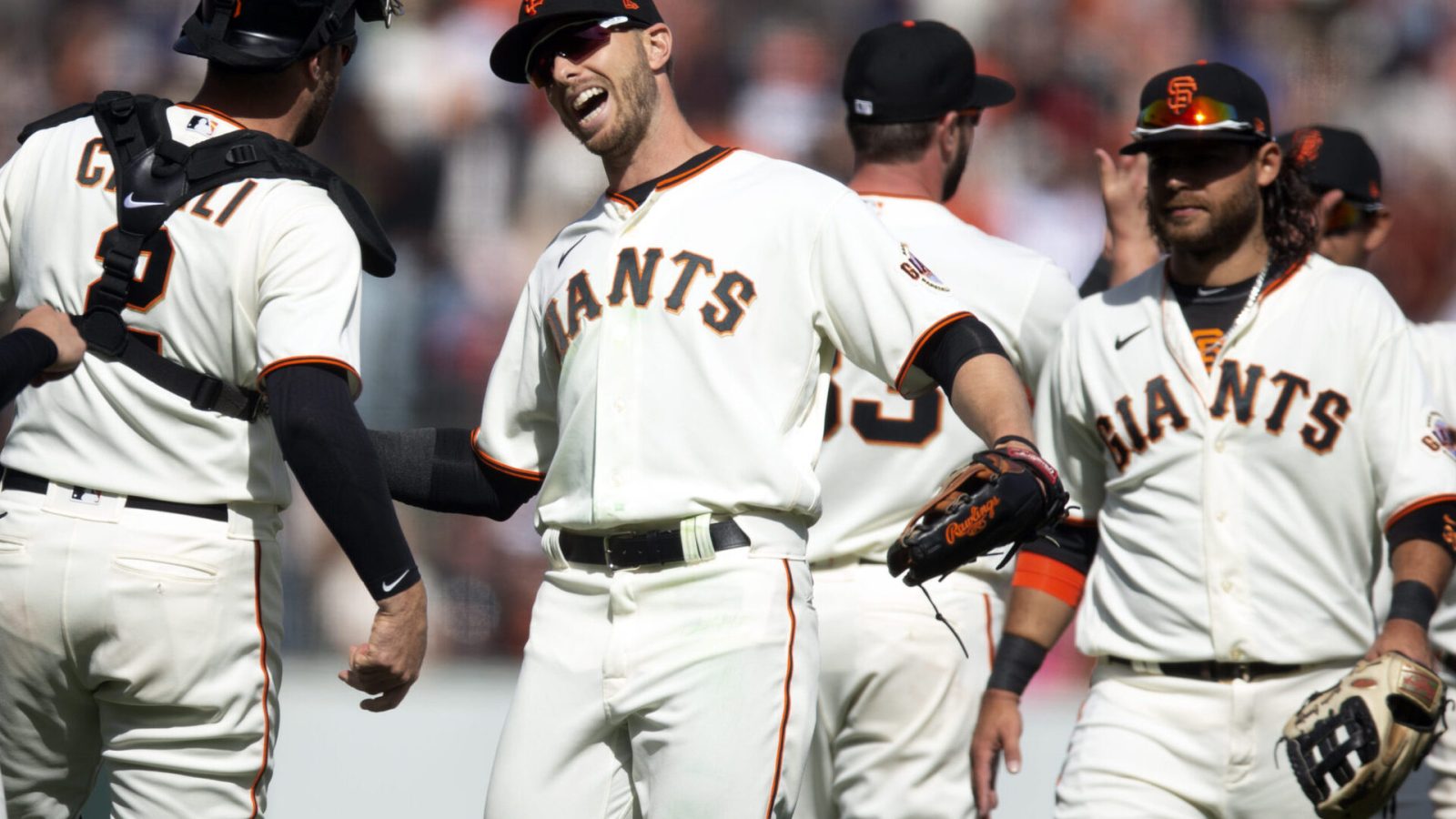 San Francisco Giants players celebrate a 3-2 victory over the Miami Marlins at Oracle Park.