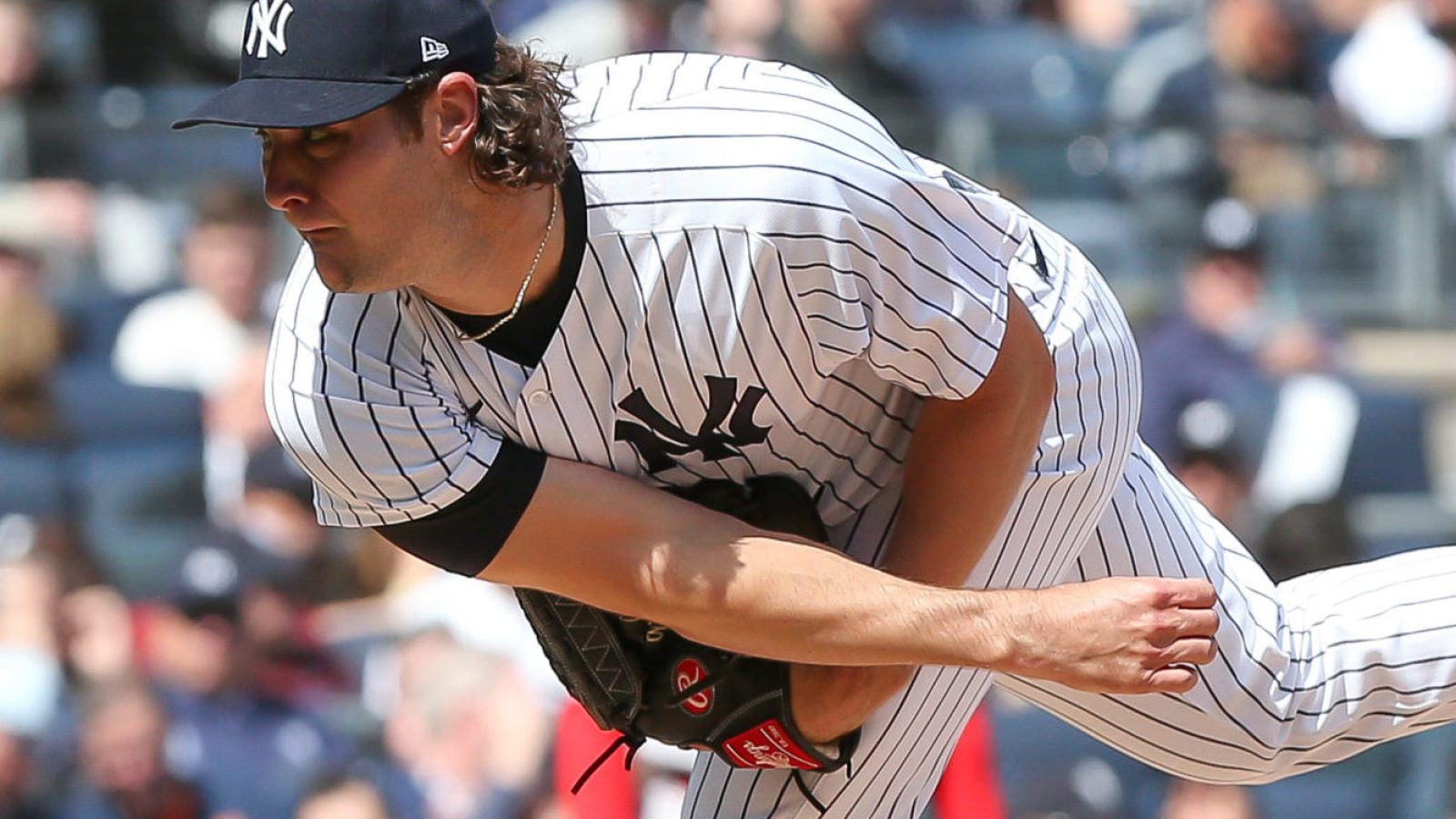 New York Yankees starting pitcher Gerrit Cole (45) pitches the ball against Boston Red Sox during the third inning at Yankee Stadium on April 8, 2022.