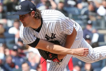 New York Yankees starting pitcher Gerrit Cole (45) pitches the ball against Boston Red Sox during the third inning at Yankee Stadium on April 8, 2022.