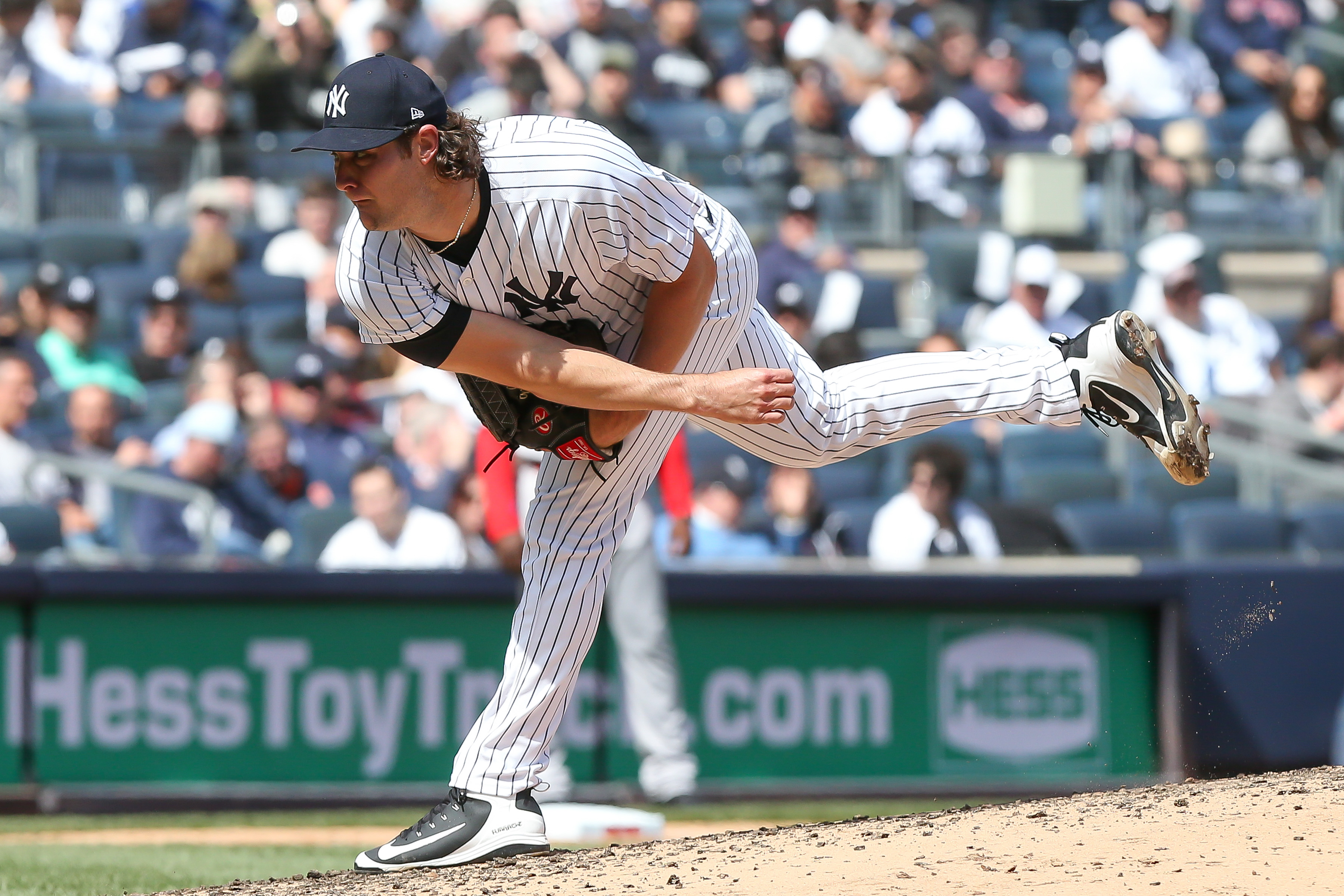 New York Yankees starting pitcher Gerrit Cole (45) pitches the ball against Boston Red Sox during the third inning at Yankee Stadium on April 8, 2022.