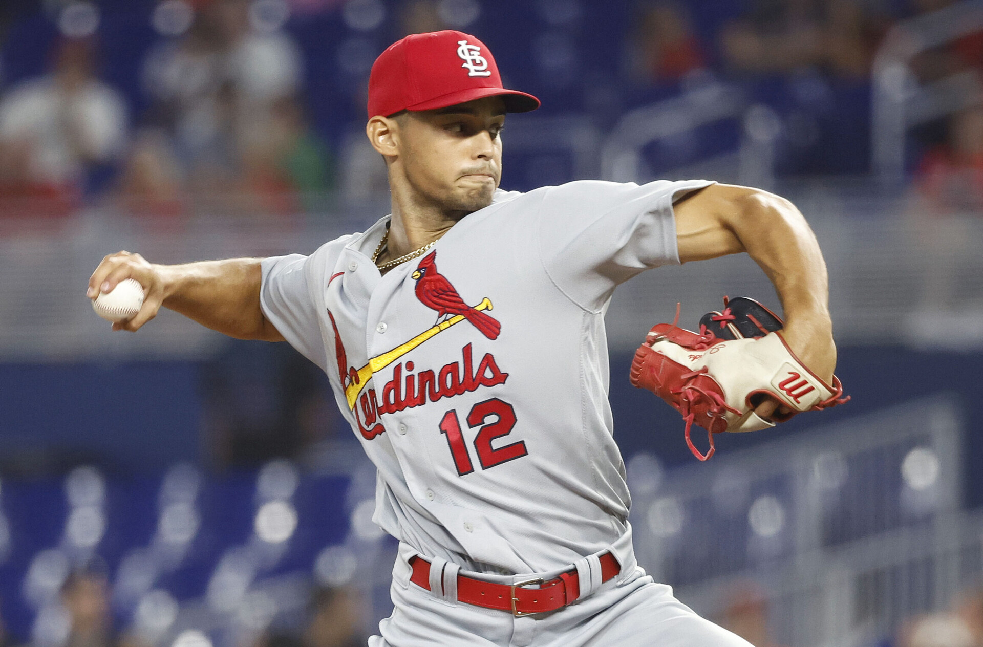 St. Louis Cardinals right-handed pitcher Jordan Hicks reaches back with he baseball and prepares to deliver a pitch during the first inning against the Miami Marlins