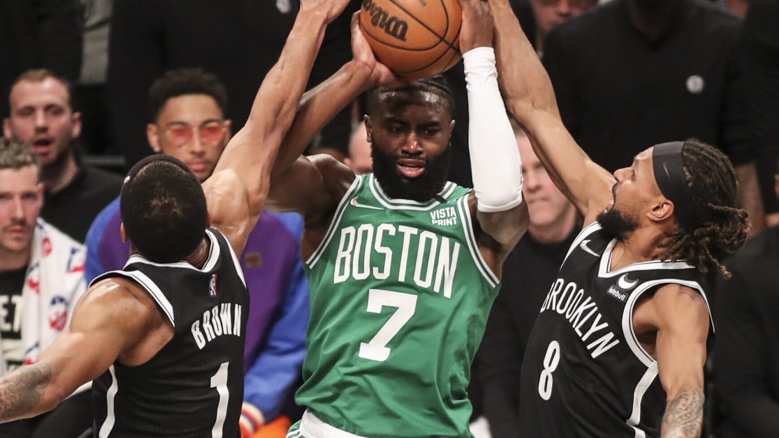 Brooklyn Nets guard Patty Mills (8) forces a tie up against Boston Celtics guard Jaylen Brown (7) in the second quarter at Barclays Center in Brooklyn on Saturday, April 23, 2022.
