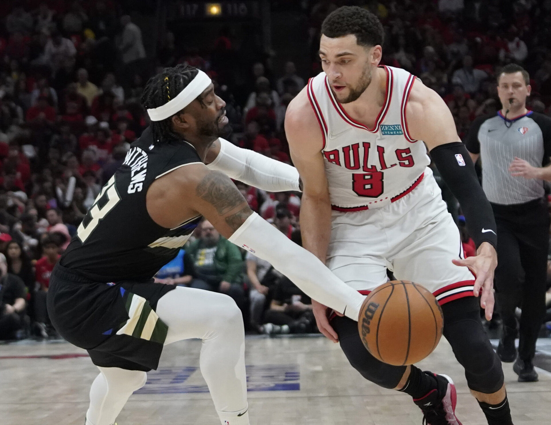 Milwaukee Bucks guard Wesley Matthews (23) defends Chicago Bulls guard Zach LaVine (8) in the second half during game four of the first round for the 2022 NBA playoffs at United Center in Chicago on Sunday, April 24, 2022.