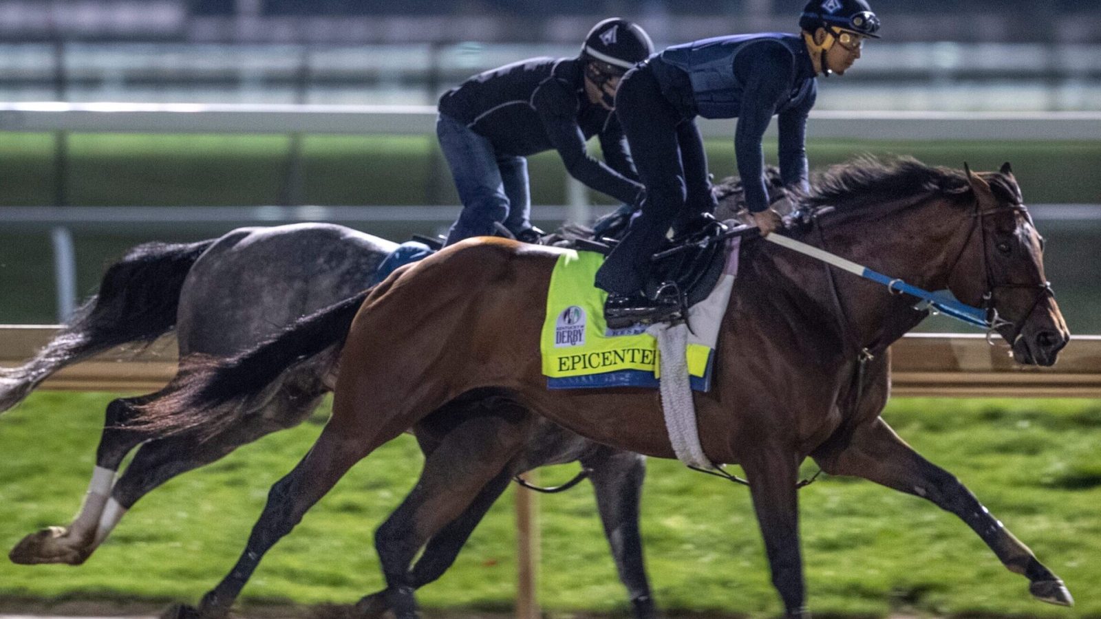 Kentucky Derby favorite, Epicenter, works out with a stable mate before dawn at Churchill Downs on April 24, 2022.