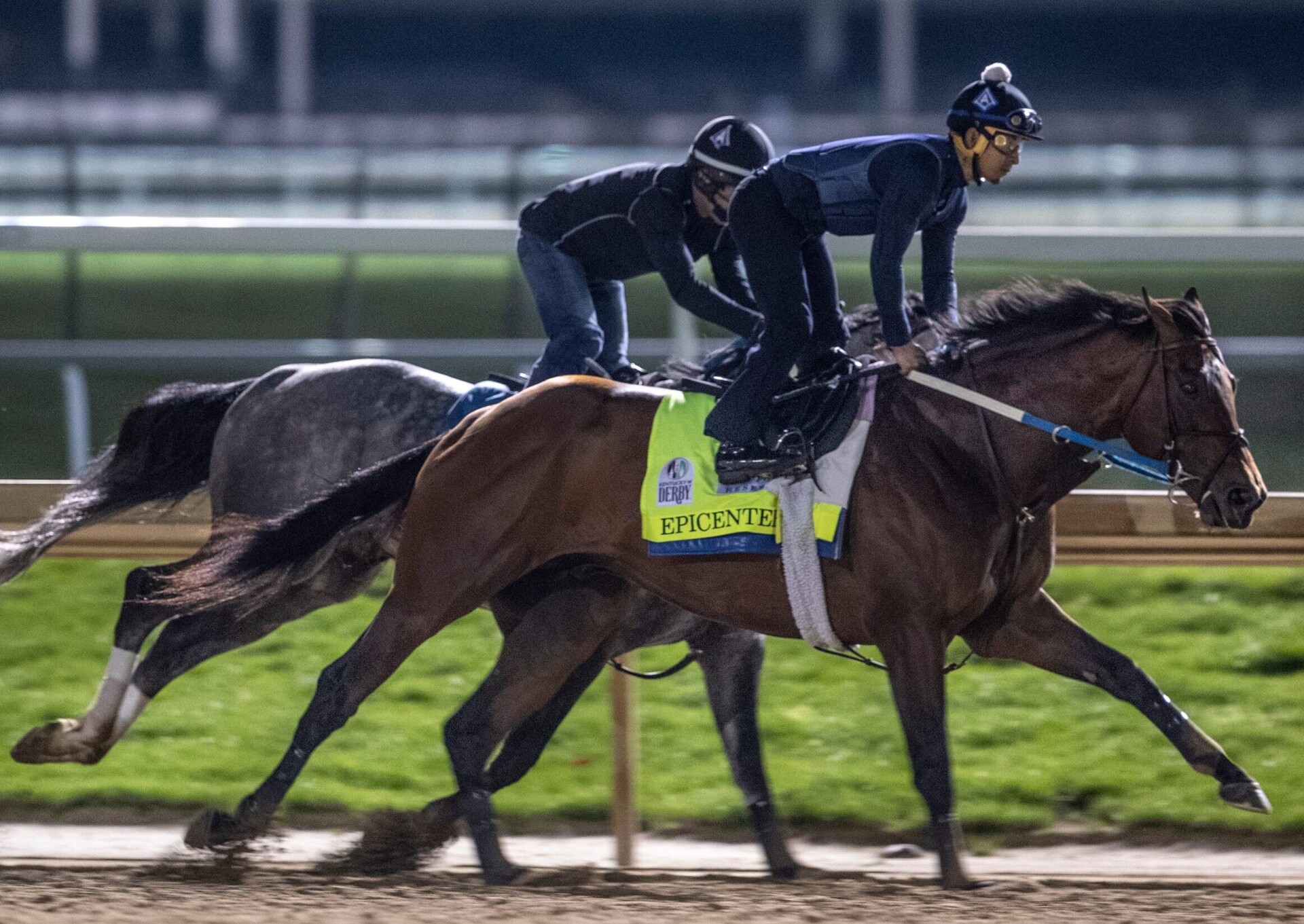 Kentucky Derby favorite, Epicenter, works out with a stable mate before dawn at Churchill Downs on April 24, 2022.
