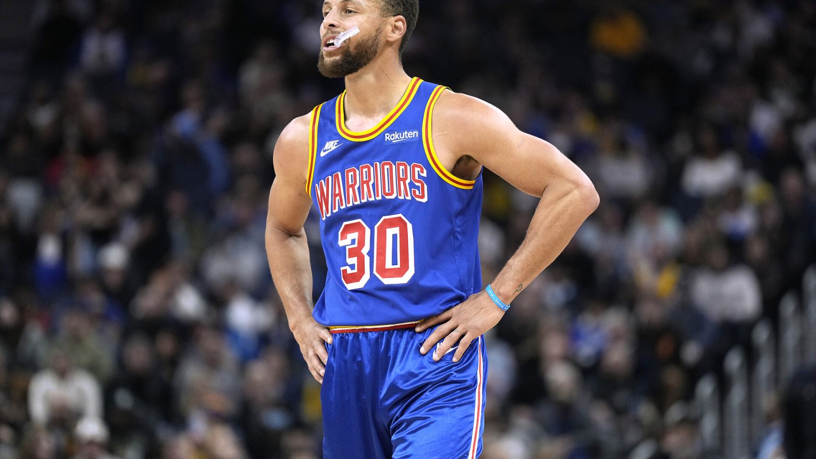 Stephen Curry #30 of the Golden State Warriors looks on against the Milwaukee Bucks in the second half of an NBA basketball game at Chase Center on March 12, 2022 in San Francisco, California.
