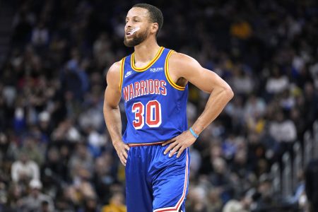 Stephen Curry #30 of the Golden State Warriors looks on against the Milwaukee Bucks in the second half of an NBA basketball game at Chase Center on March 12, 2022 in San Francisco, California.