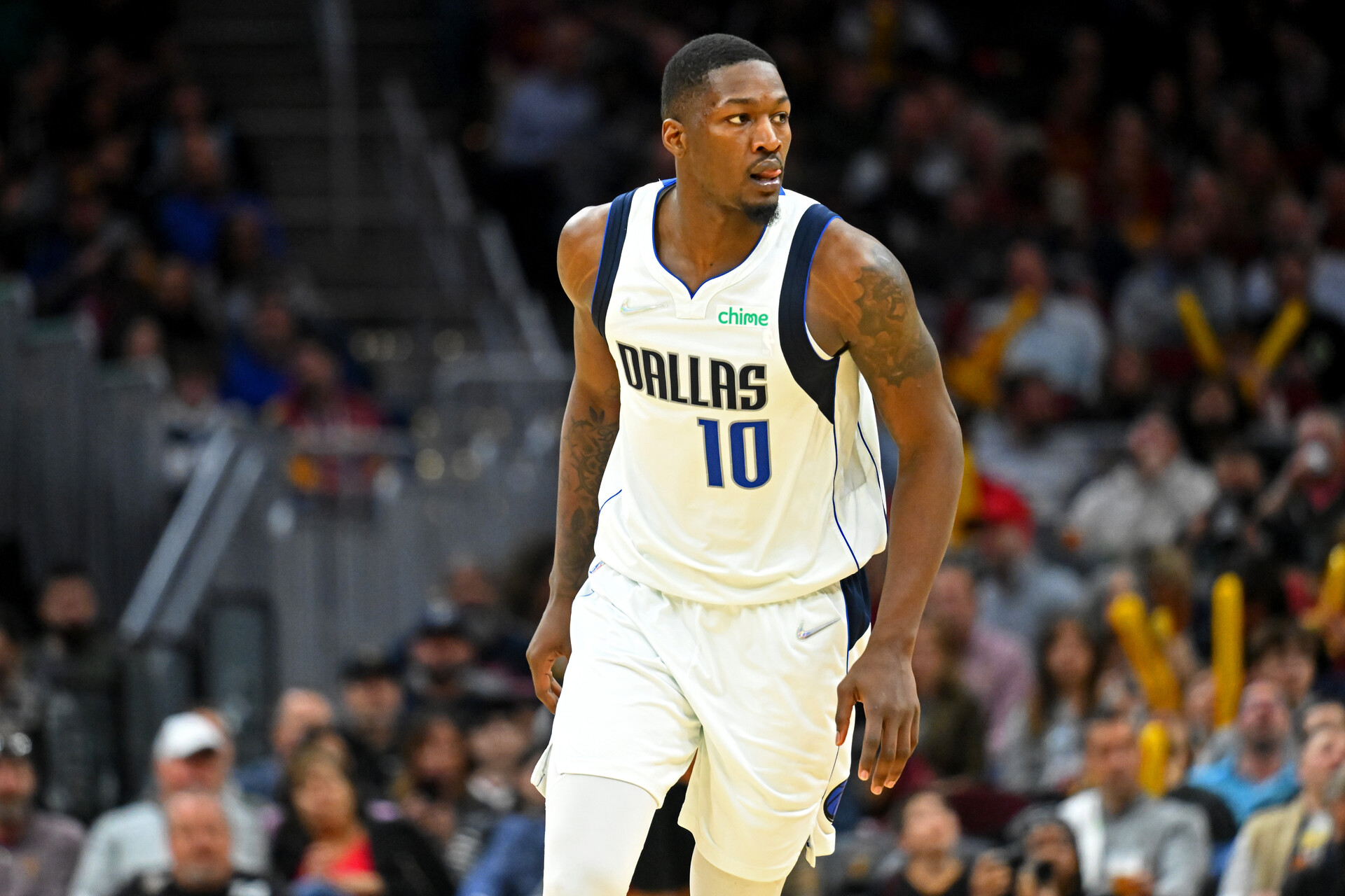 Dorian Finney-Smith #10 of the Dallas Mavericks runs down court during the third quarter against the Cleveland Cavaliers at Rocket Mortgage Fieldhouse on March 30, 2022 in Cleveland, Ohio. The Mavericks defeated the Cavaliers 120-112. 