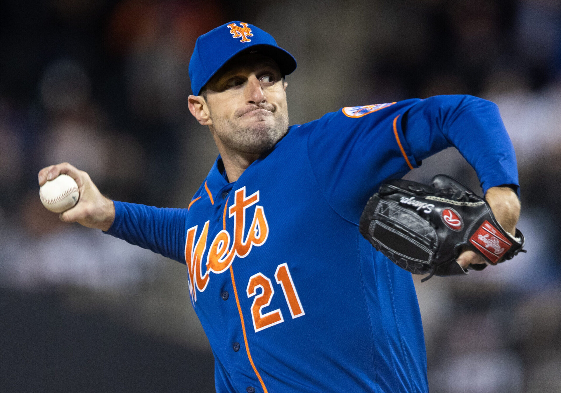 New York Mets right-handed pitcher Max Scherzer throws against the San Francisco Giants on April 19, 2022, in New York.