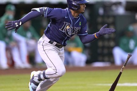 Tampa Bay Rays shortstop Wander Franco drops his bat as he runs to first base against the Oakland Athletics on Monday, May 2, 2022, in Oakland, Calif.
