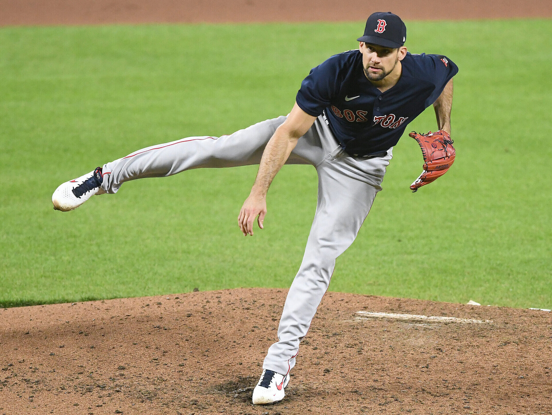 Boston Red Sox right-handed pitcher Nathan Eovaldi follows through with his right leg in the air after a delivery against the Baltimore Orioles on Saturday, April 30, 2022, in Baltimore.