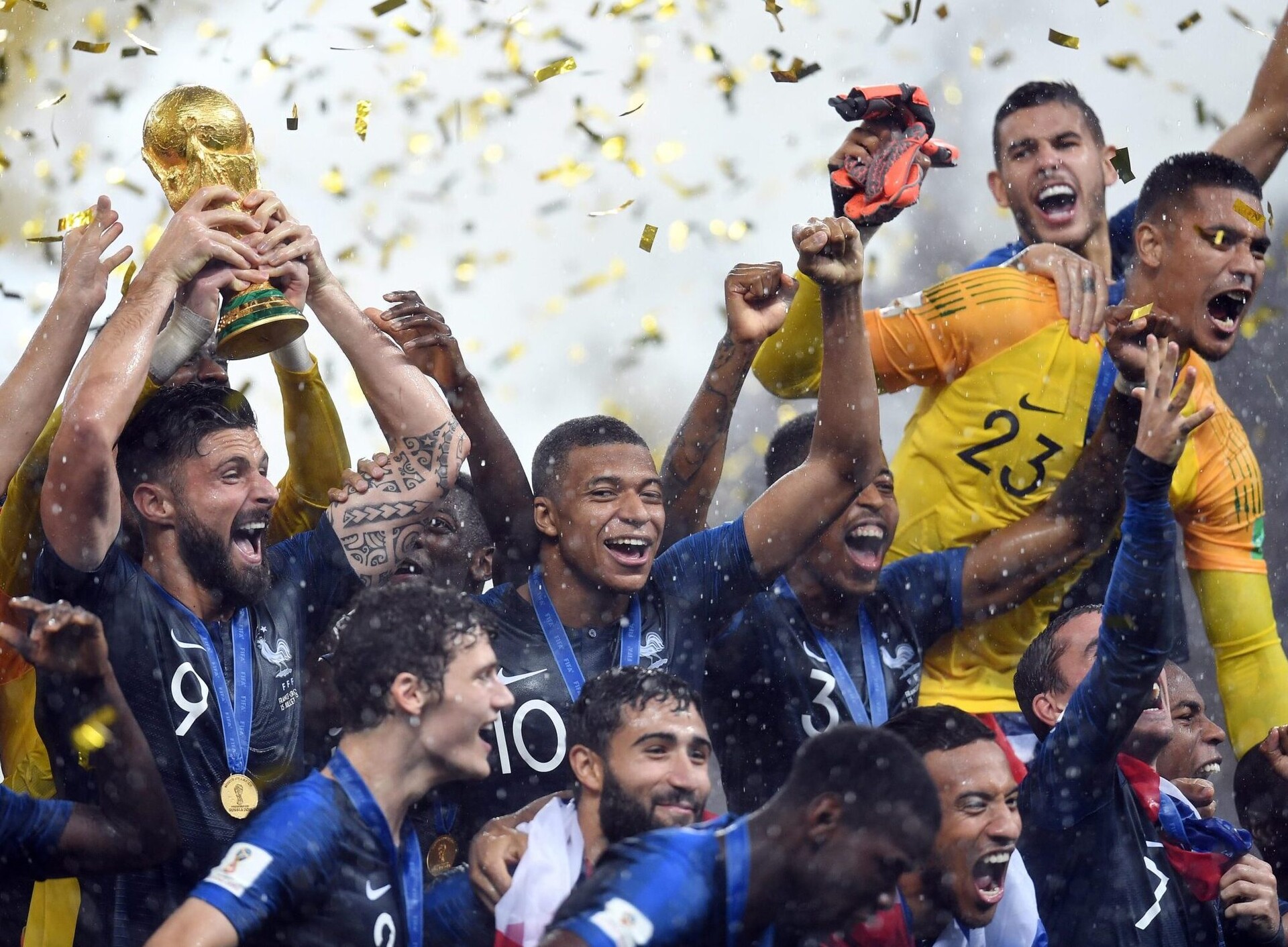 France players celebrate with the trophy after defeating Croatia in the final of the FIFA World Cup 2018 at Luzhniki Stadium on July 15, 2018.