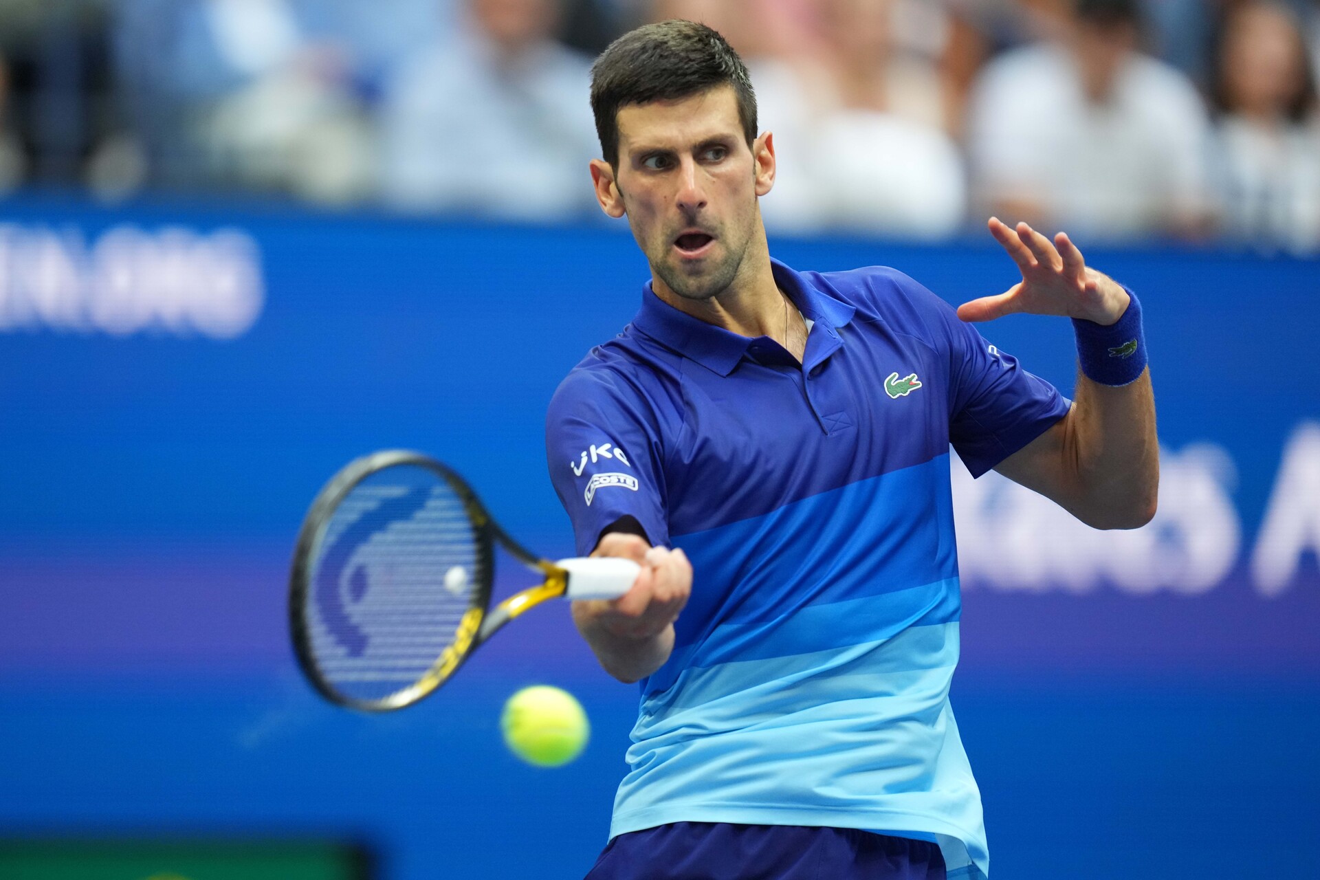 Novak Djokovic of Serbia hits a forehand against Daniil Medvedev of Russia (not pictured) in the men's singles final on day fourteen of the 2021 U.S. Open tennis tournament at USTA Billie Jean King National Tennis Center.