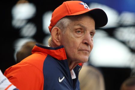 Houston furniture store owner Jim "Mattress Mack" McIngvale watches batting practice before a World Series game Oct. 31, 2021, in Atlanta.