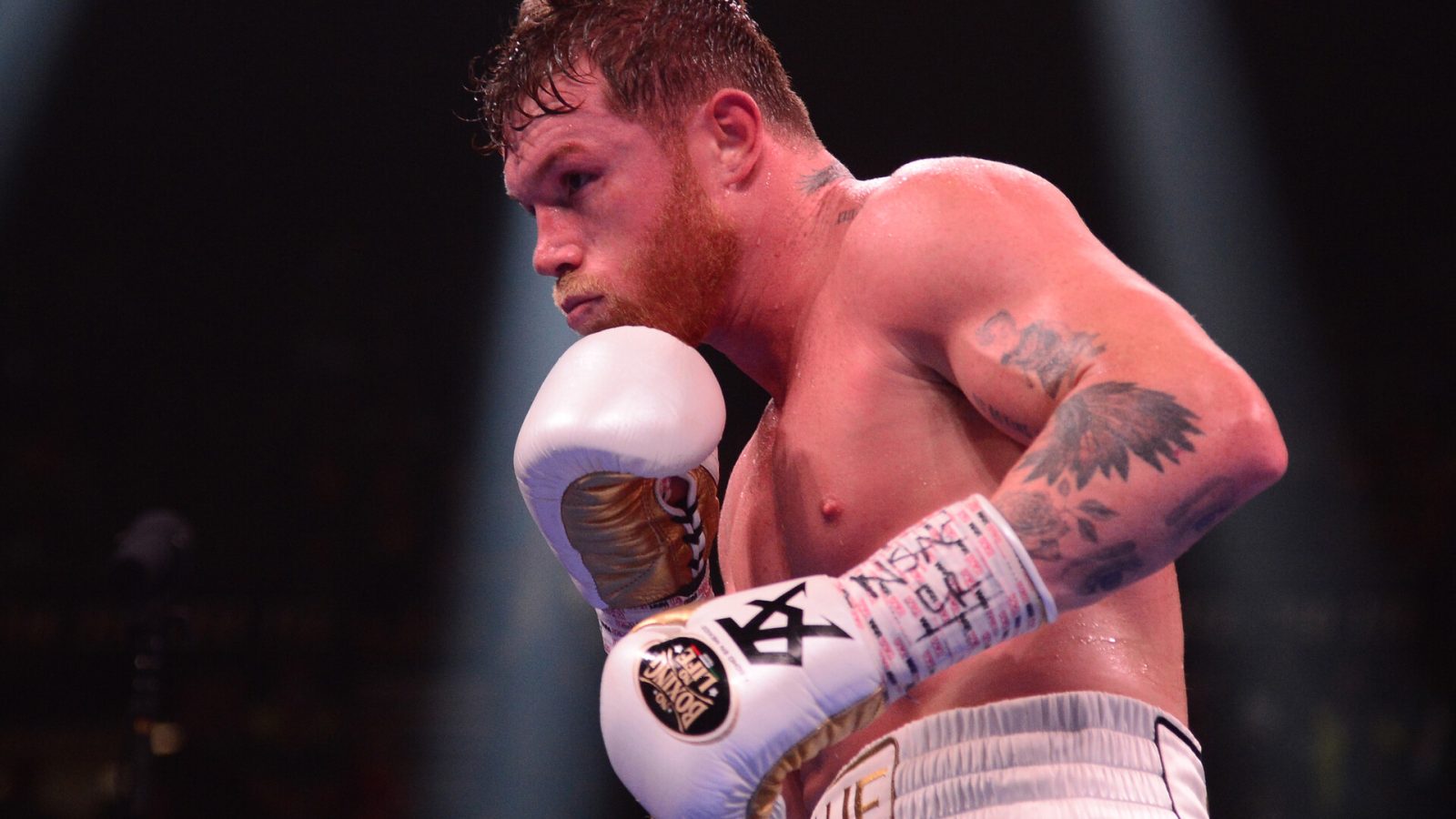 Canelo Alvarez sizes up opponent Caleb Plant (not pictured) during their undisputed super middleweight world championship boxing match