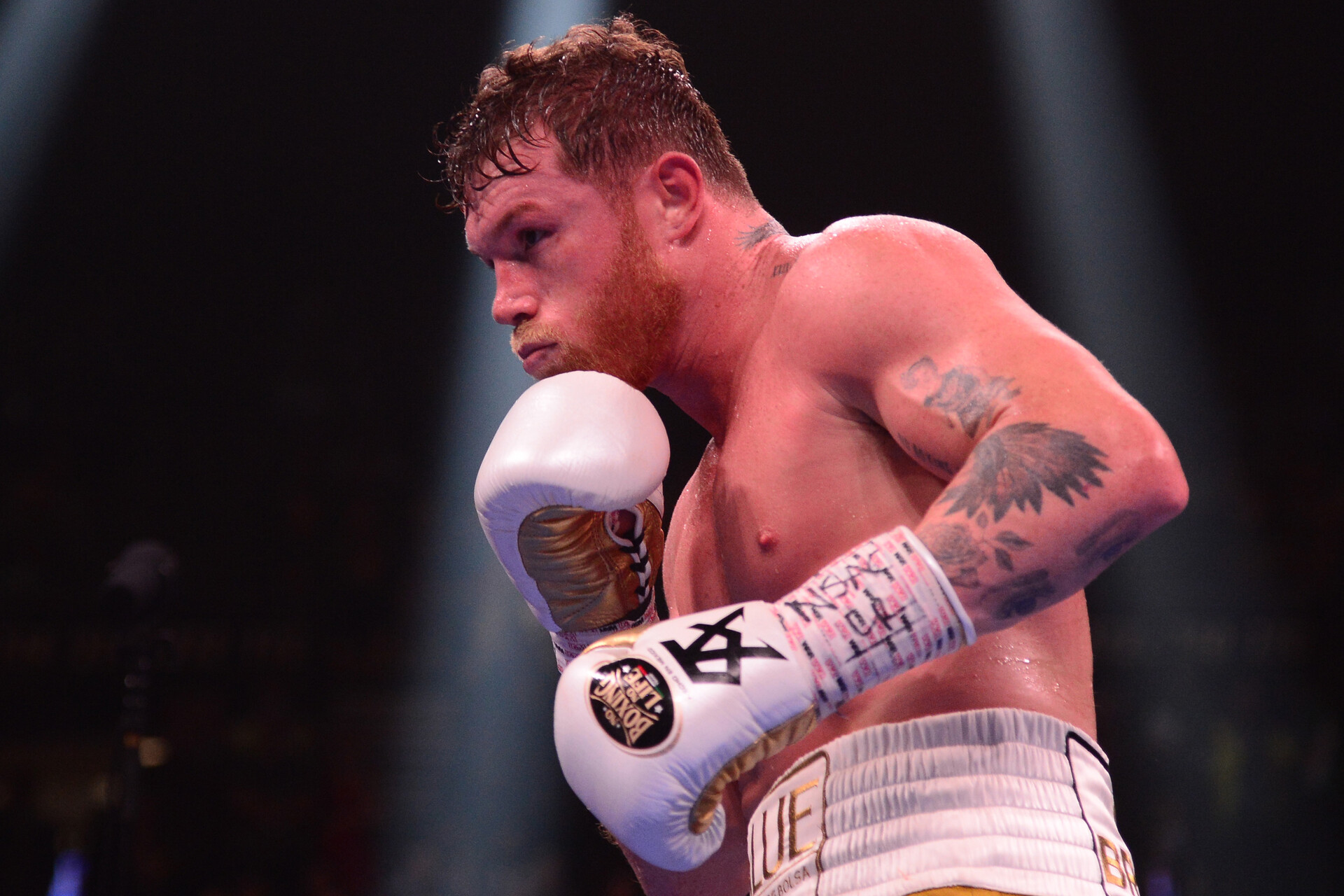 Canelo Alvarez sizes up opponent Caleb Plant (not pictured) during their undisputed super middleweight world championship boxing match