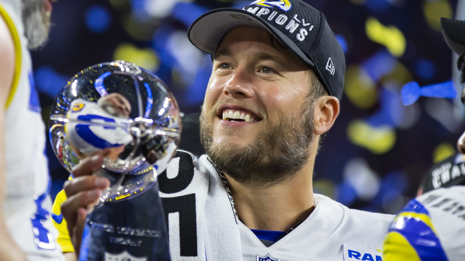 Los Angeles Rams quarterback Matthew Stafford celebrates with the Lombardi Trophy after defeating the Cincinnati Bengals in Super Bowl LVI at SoFi Stadium on Feb. 13, 2022.