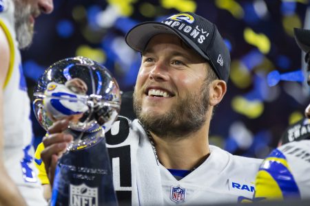 Los Angeles Rams quarterback Matthew Stafford celebrates with the Lombardi Trophy after defeating the Cincinnati Bengals in Super Bowl LVI at SoFi Stadium on Feb. 13, 2022.