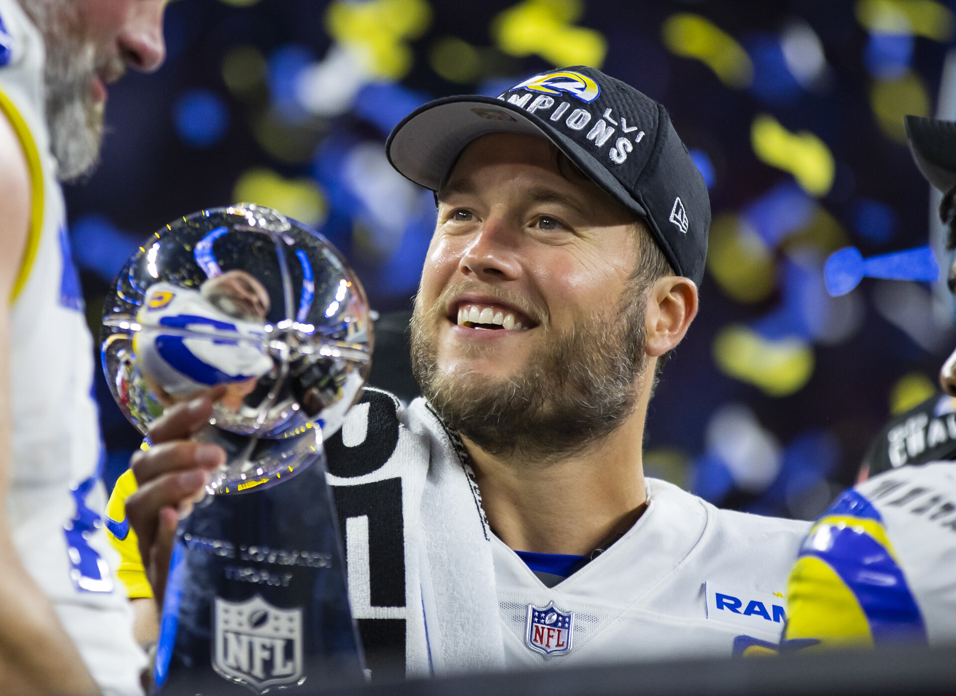 Los Angeles Rams quarterback Matthew Stafford celebrates with the Lombardi Trophy after defeating the Cincinnati Bengals in Super Bowl LVI at SoFi Stadium on Feb. 13, 2022.