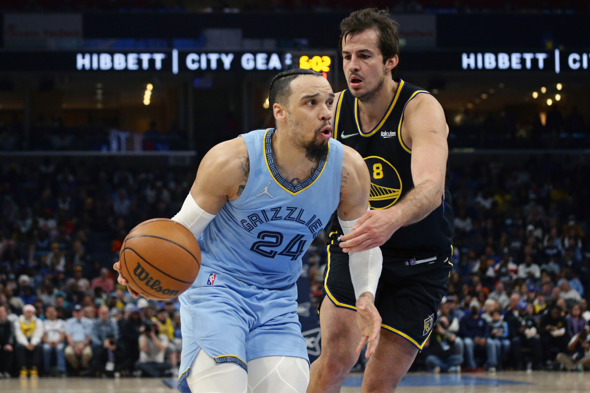 Memphis Grizzlies guard Dillon Brooks (24) drives to the basket as Golden State Warriors forward Nemanja Bjelica (8) defends during the first half at FedExForum.
