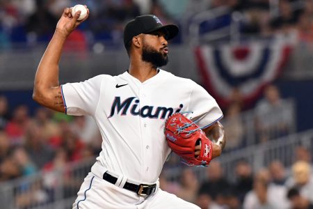 Miami Marlins right-handed starting pitcher Sandy Alcantara grips the baseball in his right hand and prepares to deliver a pitches against the Philadelphia Phillies