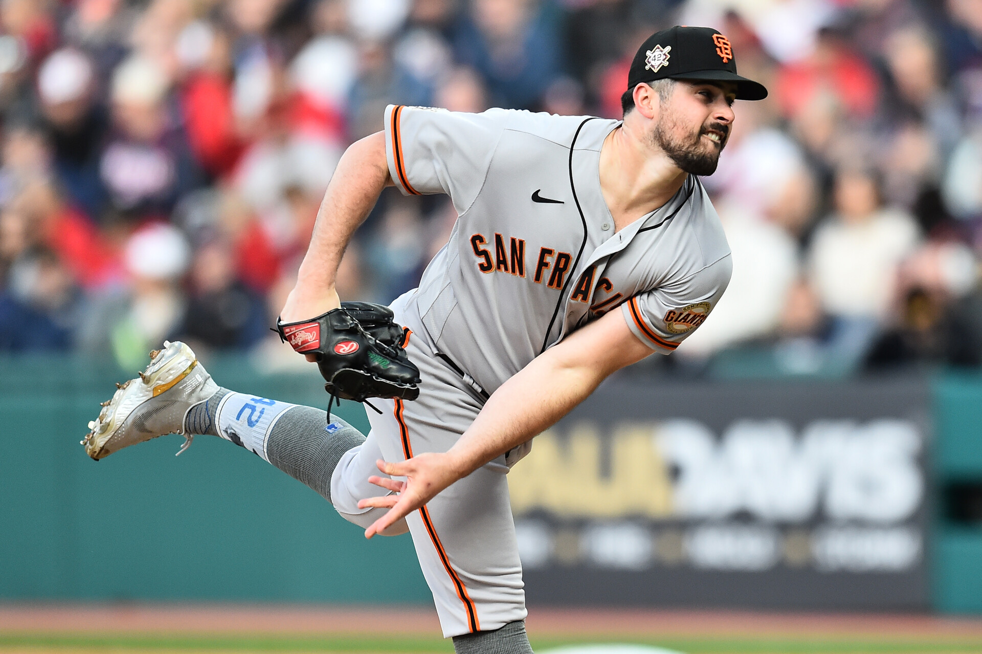 San Francisco Giants starting pitcher Carlos Rodon throws a pitch during the first inning against the Cleveland Guardians at Progressive Field.