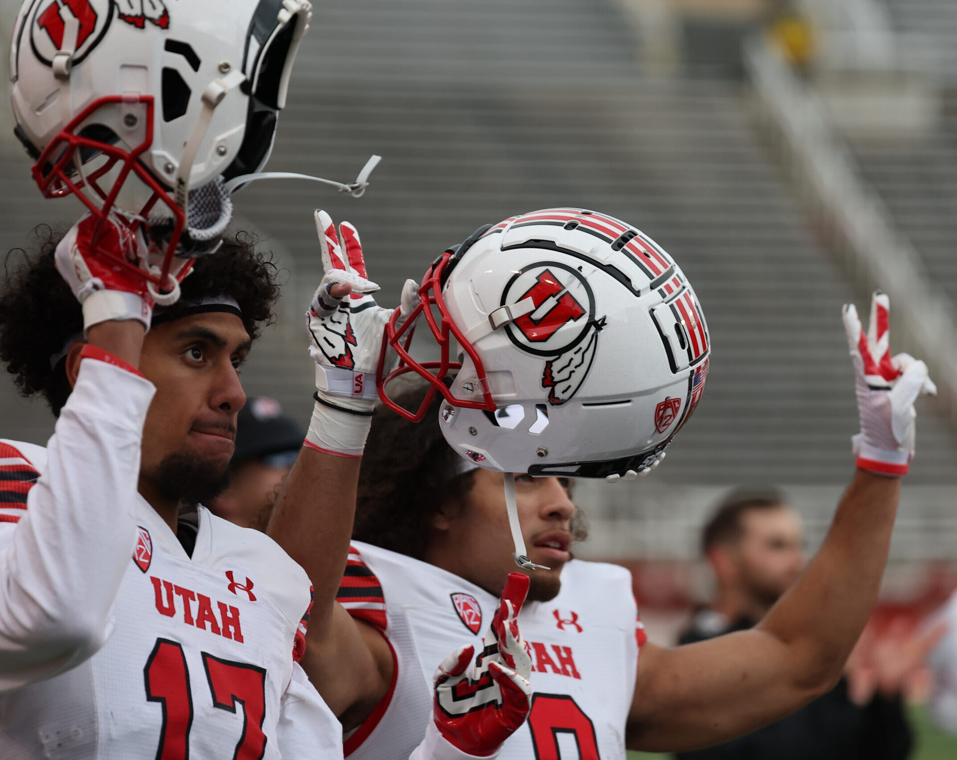 At the 2022 spring game, Utah Utes players celebrate a moment of loudness between the third and fourth quarters in memory of Ty Jordon and Aaron Lowe.